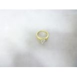 An 18ct gold engagement ring set diamond solitaire
