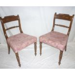 A set of six 19th Century mahogany dining chairs with rope twist rail backs and upholstered seats