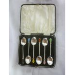 A set of 6 silver & enamelled Art Deco coffee spoons with enamelled terminals,