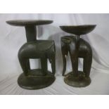 Two old African carved wood stools with elephant supports