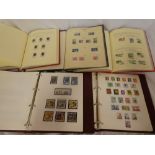 Five folder albums containing a collection of Australia & Jamaica stamps