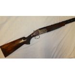 A 12 bore o/u ejector shotgun by Browning model Ultra XS, multi-choke with additional chokes,