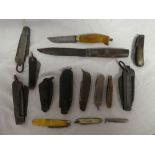 A collection of various knives including military jack knives, horn & antler mounted pruning knives,