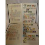 Two stock books containing a collection of World stamps including Columbia, Brazil, Chile, Jordan,