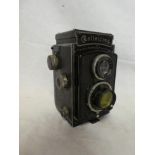 A Rolleicord 1A twins lens reflex camera with yellow filter circa 1935