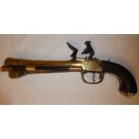 A rare 18th Century flintlock brass barrelled blunderbuss pistol with spring bayonet by Waters & Co