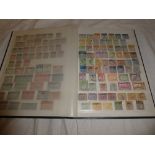 A stock book containing a collection of British Empire and British Commonwealth stamps,
