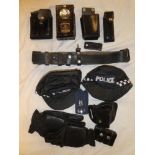 A Warwickshire Constabulary hand lamp, various Police belt,