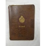 A British South African Police leather pocket book cover and pocket book