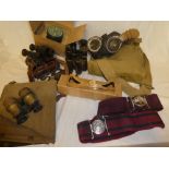 A Second War webbing map case, various pairs of binoculars, 1944 dated Clino mortar gauge,