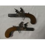 A pair of quality flintlock pocket pistols by Dunderdale,