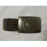 An original German Second War Army steel buckle with part leather strap