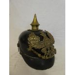 A First War ordinary ranks German leather pickelhaube with brass field eagle plate and fittings