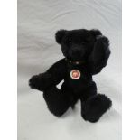 A modern Steiff black plush growling teddy bear