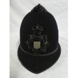 A George VI Policeman's blue helmet of the Cornwall Constabulary with blackened Kings crown badge