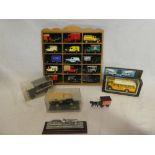 A selection of various die-cast vehicles in wooden display stand together with boxed die-cast Malta