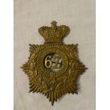 A Victorian brass ordinary ranks helmet plate of the 67th Regiment of Foot with detachable centre