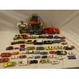 A selection of various boxed and un-boxed die-cast vehicles including Corgi James Bond Aston Martin
