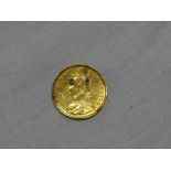 A Victorian 1887 gold half sovereign (light brooch marks)