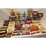 A selection of various boxed & un-boxed die-cast vehicles including Corgi classic buses,