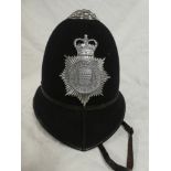 An EIIR post 1952 Policeman's blue helmet of the Cornwall Constabulary with chromium plated helmet