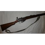 A converted First War short magazine Lee Enfield rifle as a single shot .410 shotgun No.