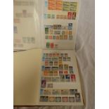 A stock book containing a collection of New Zealand stamps,