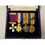 A First War miniature group of four medals:- DSO and 1914/15 star trio with MID Emblem,