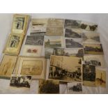 A selection of various black & white and coloured postcards including photographic examples of