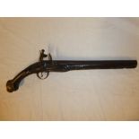 An 18th Century Continental flintlock holster pistol with 12" inch steel barrel,