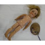 A porcelain headed doll by Jumeau with composition jointed body 17" inches long