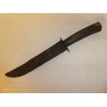 A large 19th Century bowie knife with 10½" inch blade and wood handle (af)