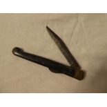 A Victorian folding pocket knife with single edged blade and ebony grips