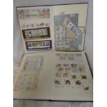 Two stock books containing a selection of Jersey stamps 1970 - 2000 including mini sheets together