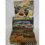 Two Scalextric racing cars together with three boxes containing mainly track for Scalextric 300,