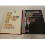 Two stock books containing a collection mint and used stamps - Estonia, Monaco,