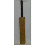 A 1940's/50's cricket bat bearing the signatures of eleven County Cricket teams including Yorkshire,