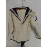 An original First War Royal Navy ratings linen jacket with proficiency badges