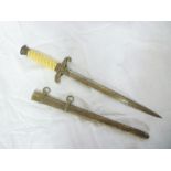 An original German Nazi Second War Army Officers dagger with double edged steel blade,