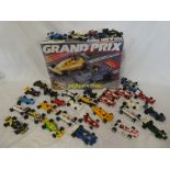 A selection of over 30 Scalextric Formula 1 and other racing cars and a Scalextric Grand Prix part