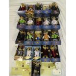 A collection of 21 boxed Meerkat toys with certificates