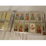 An album of various Royalty related cigarette and other cards including Godfrey Phillips Famous