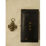 An original fitted case for a Distinguished Service Order and a French First War Croix De Guerre