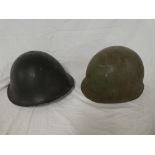 Two various Military steel helmets