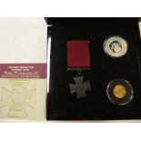 A First World War commemorative coin set comprising 1913 gold sovereign,