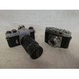 A Zeiss Ikon 35mm camera and a Pentax Asahi Spotmatic camera (2)