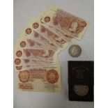 A brown ten shilling note signed O'Brien, ten E11R brown ten shilling notes,