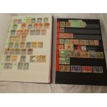 Two stock books containing a collection World Stamps including Mexico, Egypt, Grenada, Peru,