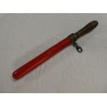 An unusual turned & painted wood Police truncheon with brass collar and iron belt hook "believed