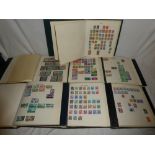 A large collection of GB, Commonwealth and World stamps contained in seven folder albums,